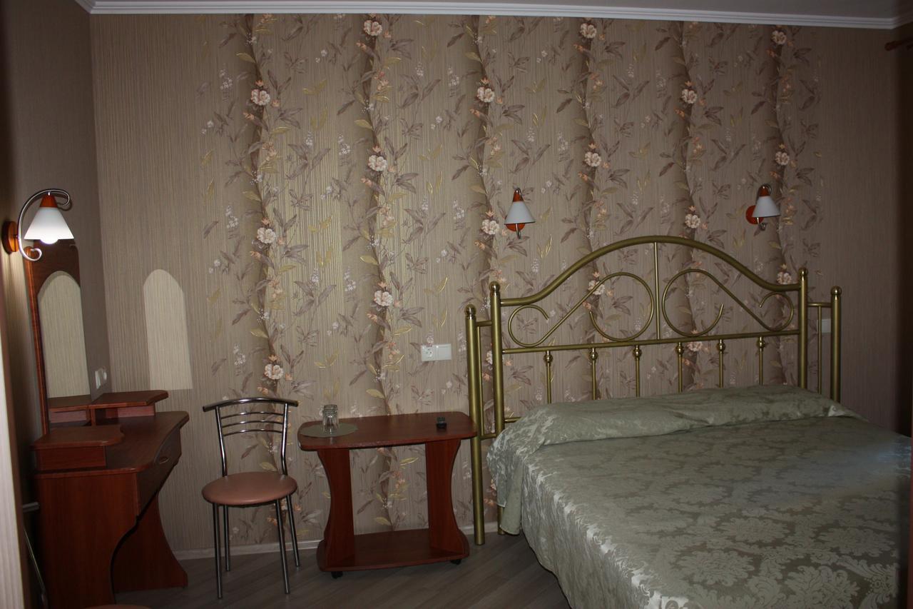 Hotel Gostynnyi Dvir Bucha Kamer foto